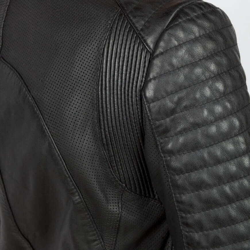 A close up of the accordion leather on the sleeve and shoulder of the Wild and Free leather motorcycle jacket