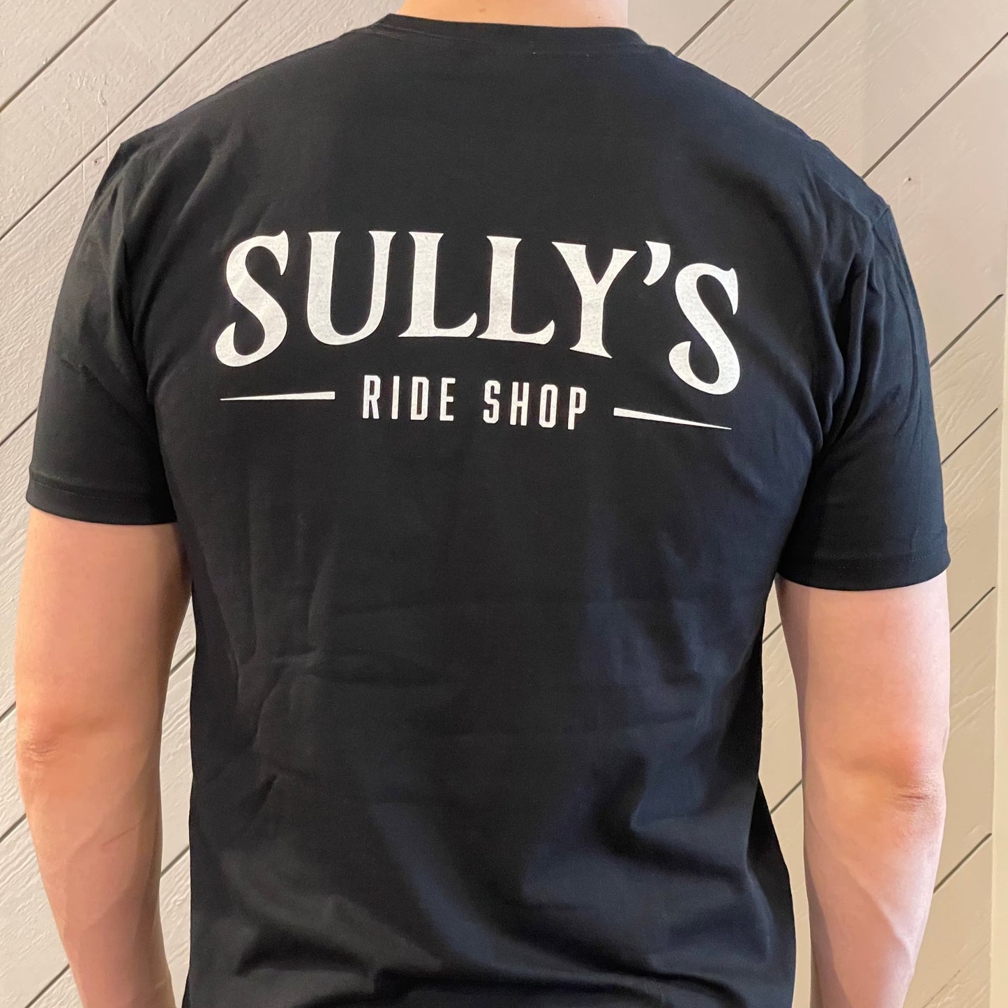 Sully's Tee on male model showing back design