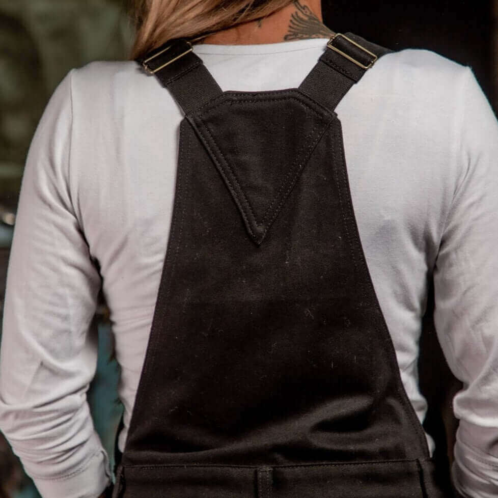 A rear view of Boondocks overalls adjustable shoulder straps 