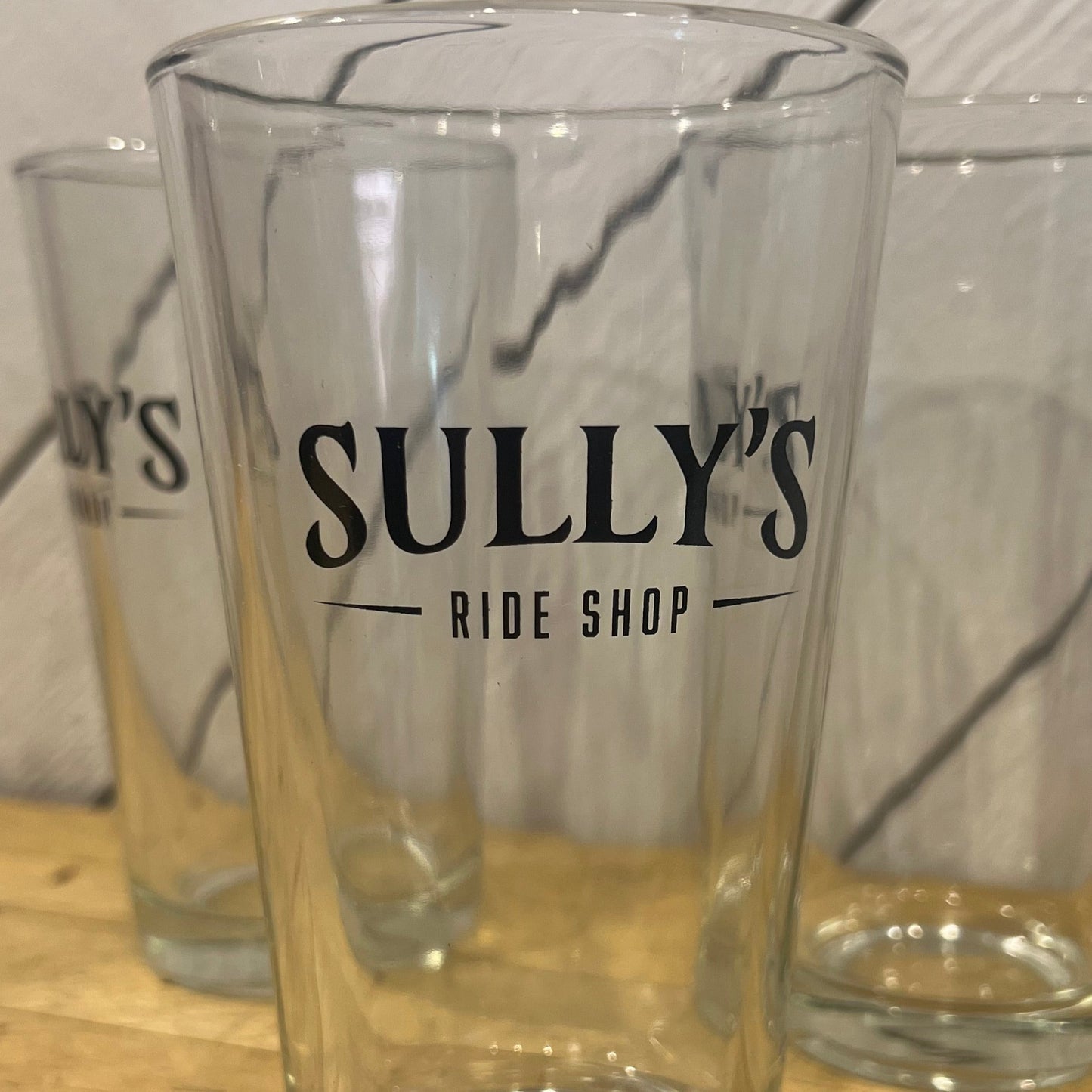 Sully's Ride Shop 16 oz. Pint glass