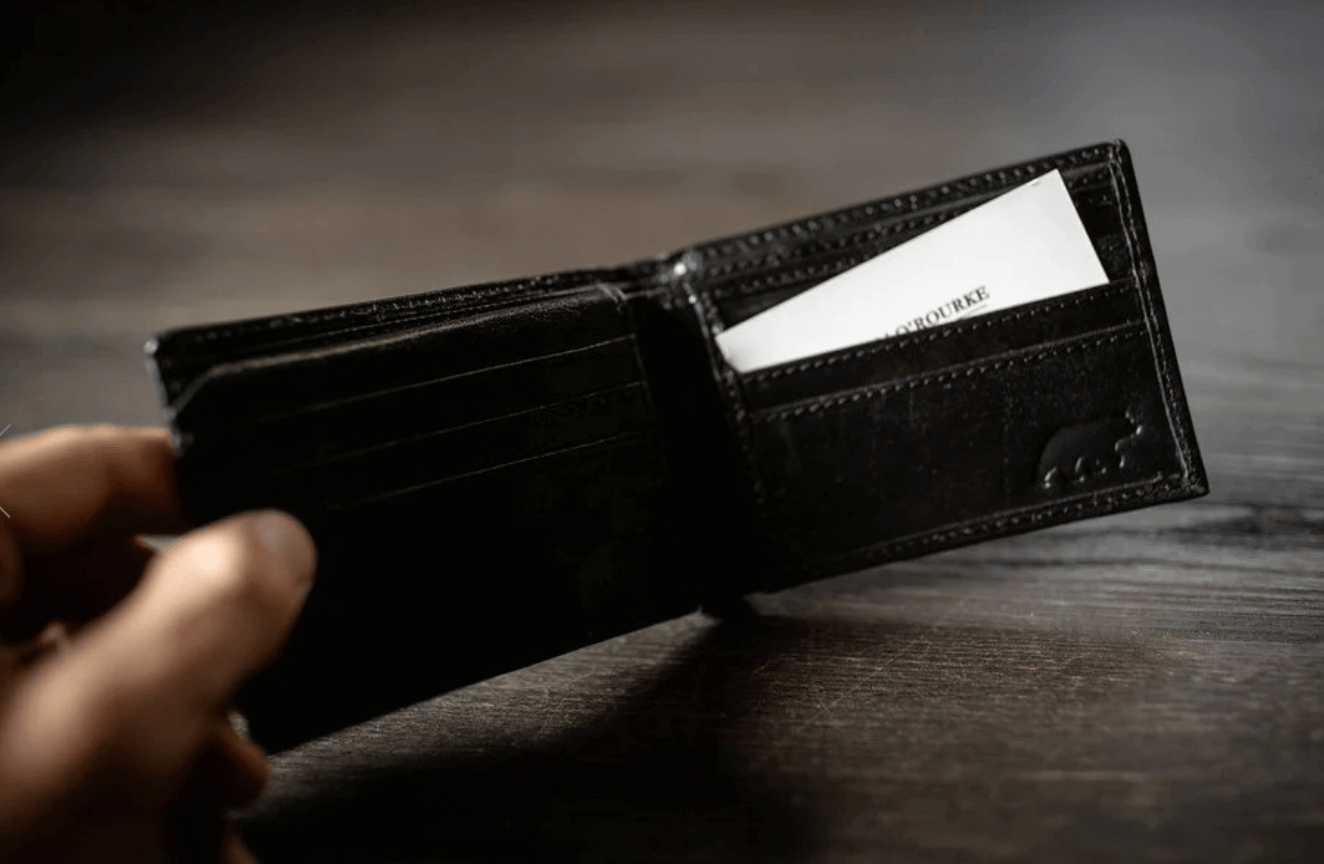 Kodiak Bifold Leather Wallet Black Unfolded In Hand