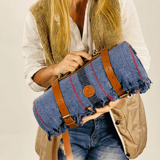 Highland Blue Blanket with Carrier held by female model